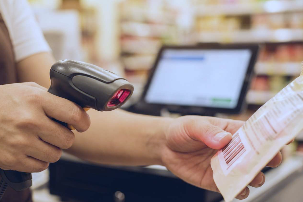 Barcode scanner reading a product label